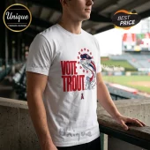 White crewneck t-shirt featuring Vote Trout text, an illustrated fish wearing a hat, and Los Angeles Angels team logo.!