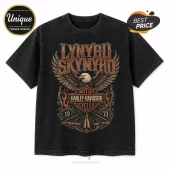 Black vintage-wash t-shirt with Lynyrd Skynyrd text, a central eagle, Harley-Davidson logo, and 1973 graphic print.!