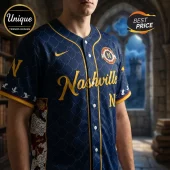 Navy blue Nashville baseball jersey featuring a dragon scale pattern, yellow cursive lettering, and side panels with clouds.!