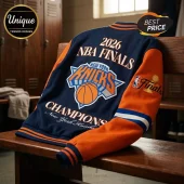 New York Knicks 2026 NBA Finals Champions varsity jacket in navy blue and orange wool with embroidered team logos.!