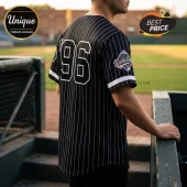 Black pinstripe baseball jersey featuring the number 96 and a World Series patch on the sleeve at a baseball stadium.!