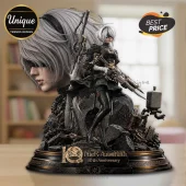Nier Automata 2B figure with white hair and blindfold, holding a sword on a detailed anniversary base with gold accents.!