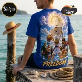 One Piece Monkey D Luffy Freedom T-Shirt features a blue crewneck with a vibrant graphic of the Straw Hat crew at sea.