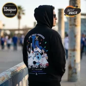 Black hoodie featuring One Piece characters wearing Los Angeles Dodgers jerseys with confetti and the text We Are One.!