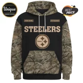 Pittsburgh Steelers hoodie with camouflage sleeves, hood, and pocket, featuring team logo and text on a black background.!