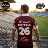 Rugby player in maroon jersey with Shell V-Power logo, number 26, and Ford branding, standing in an empty stadium.!