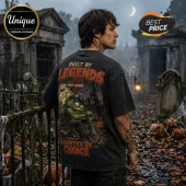 Rat Fink Harley-Davidson Haunt Hard T-Shirt featuring a green character on a motorcycle in a spooky graveyard setting.