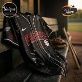 San Diego Padres black baseball jersey with gothic tattoo-style graphics of moths, skulls, and spiderwebs on a bench.!
