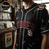 San Diego Padres black baseball jersey with maroon lettering, white pinstripes, and skull and bird graphic prints.!