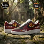 Custom Scorpions rock band sneakers with red and black panels, gold scorpion logo, and white rubber soles on stone floor.!