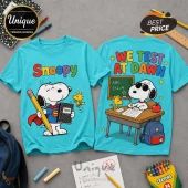 Turquoise t-shirts featuring Snoopy as Superman on the front and studying at a school desk on the back.!