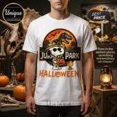 Snoopy x Jurassic Park Life Finds A Way T-Shirt featuring Snoopy in a safari hat holding a pumpkin against a dinosaur logo.