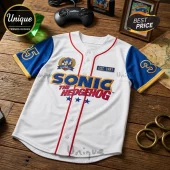 Sonic the Hedgehog white baseball jersey with blue sleeves, red piping, and 30th anniversary embroidery on wood table.!