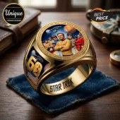 Gold-tone Star Trek commemorative ring featuring Captain Kirk, Spock, and the crew with 1966-2026 and space imagery.!
