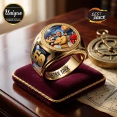 Gold Star Trek 60th anniversary ring featuring the original cast, USS Enterprise, and text on a maroon velvet cushion.!