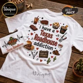 White graphic t-shirt featuring Texas Roadhouse food illustrations, hearts, and the text I have a Texas Roadhouse addiction.!