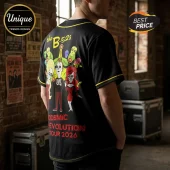 Black baseball jersey with The B-52s Cosmic Revolution Tour 2026 print featuring sugar skull characters on back.!
