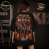 Vintage KISS I May Be Old Band black t-shirt featuring graphic art of band members over a fiery stage background.