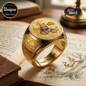 Winnie the Pooh 100th Anniversary Gold Engraved Ring featuring a colored Pooh bear illustration and vintage book background.