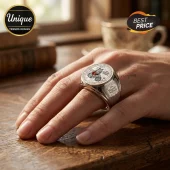 Winnie the Pooh 100th Anniversary Silver Ring featuring an engraved character face on a polished metallic band.