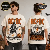 AC/DC High Voltage Halloween off-white T-shirt featuring a skeleton guitarist, lightning bolts, and concert graphics.
