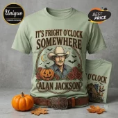 Alan Jackson Halloween Country Music T-Shirt in sage green with a graphic of the singer, a pumpkin, and bats.