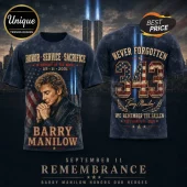 Barry Manilow 9/11 Memorial 343 Tribute T-Shirt featuring a portrait of Barry Manilow, American flag graphics, and text.