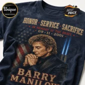 Barry Manilow 9/11 Memorial 343 Tribute T-Shirt featuring a praying singer, American flag, and twin tower light beams.