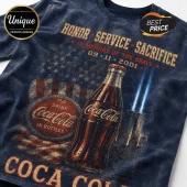 Coca Cola 9/11 Memorial Tribute T-Shirt featuring a vintage soda bottle, American flag, and twin towers graphic on navy blue.
