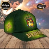 Elvis Presley Graceland 2026 Elvis Week green cap with gold TCB lightning bolt, acoustic guitar graphic, and text design.