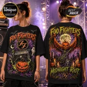 Foo Fighters Midnight Riot Halloween Rock Band T-Shirt with orange pumpkin, purple graveyard, and guitar graphics.