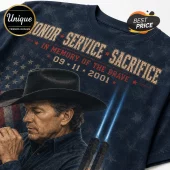 George Strait 9/11 Tribute Never Forgotten T-Shirt features a cowboy, twin towers beam of light, and patriotic US flag text.