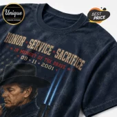 George Strait 9/11 Tribute Never Forgotten T-Shirt featuring a black acid-wash fabric, cowboy graphic, and red text.