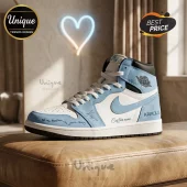 Karol G Custom Name Light Blue High Top AJ1 Sneakers featuring white leather base with light blue overlays and text details.