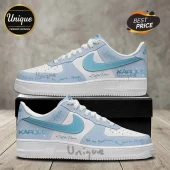 Karol G Light Blue Custom Name AF1 sneakers featuring white leather, light blue accents, and cursive typography graphics.