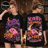 Kirby Halloween Spooky Night T-Shirt showing pink character in witch hat, jack-o'-lanterns, and ghosts on black fabric.