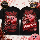 Kirby x Coca-Cola Soda Theme T-Shirt features a pink Kirby character holding a glass cola bottle with red soda-themed text.