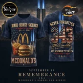 McDonald's 9/11 Tribute 343 Fallen Heroes T-Shirt showing a burger meal, twin tower lights, and flag graphics on dark fabric.
