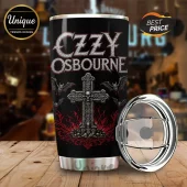 Ozzy Osbourne Gothic Skull Tumbler featuring a central cross, flying bats, and dark red filigree on a black background.