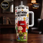 Snoopy and Friends Don't Worry Be Happy 3D tumbler with embossed characters, a red doghouse, and custom name Sophia label.