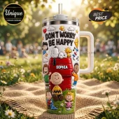 Snoopy and Friends Don't Worry Be Happy 3D tumbler featuring Peanuts characters, a red doghouse, and personalized name plate.