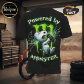 Snoopy Powered by Monster Energy T-shirt features a cartoon dog drinking an energy can with a vibrant green neon logo.
