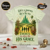 Wizard of Oz His Grace Inspirational T-Shirt in pale green with emerald city, characters, and yellow brick road design.